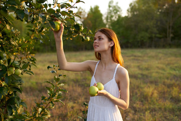 woman with green apple