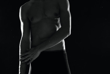 muscular man in black underwear