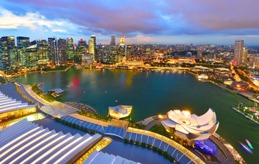 view of Singapore skyline view of skyscrapers on Marina Bay at sunset