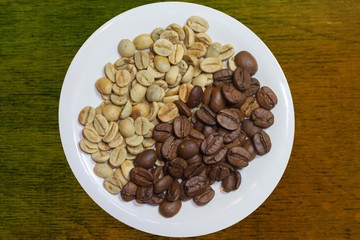 top view of roasted coffee beans and green coffee