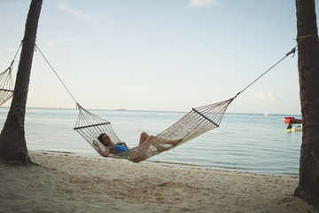 Naklejka premium fishing on the beach