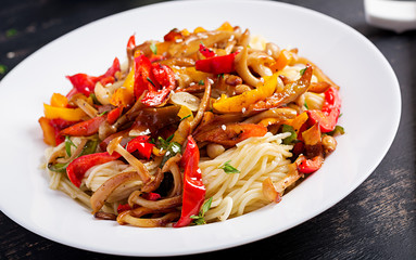 Noodles with shimeji mushrooms and paprika. Oriental meal. Japanese Shimeji mushroom stir fry.