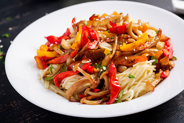 Noodles with shimeji mushrooms and paprika. Oriental meal. Japanese Shimeji mushroom stir fry.