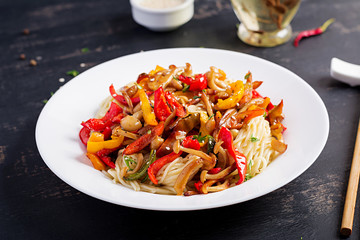 Noodles with shimeji mushrooms and paprika. Oriental meal. Japanese Shimeji mushroom stir fry.