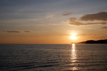 Fototapeta na wymiar Sunset in the sea at Chonburi