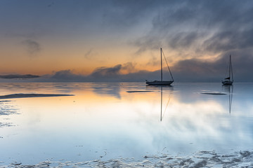 Fototapeta na wymiar Misty Morning Sunrise Waterscape