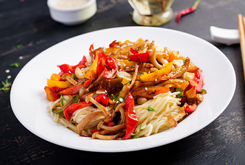 Noodles with shimeji mushrooms and paprika. Oriental meal. Japanese Shimeji mushroom stir fry.