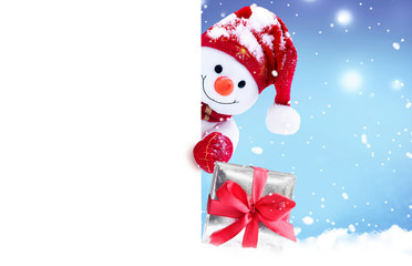 Cute funny snowman holding white page, greeting Christmas card.