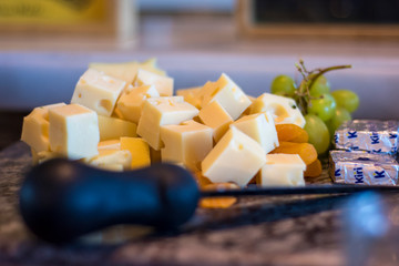 cheese on the table of a restaurant ready to serve.