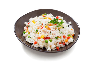 Bowl of rice with vegetables isolated on white background.
