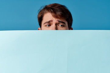 young man holding a board