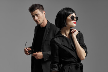 man and woman with gun