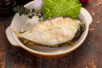 Baked wolffish steak