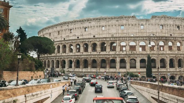 Rome, Italy. Colosseum. Traffic Near Flavian Amphitheatre. Famous World Landmark UNESCO.