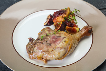 Roasted. duck. leg with plum and apple