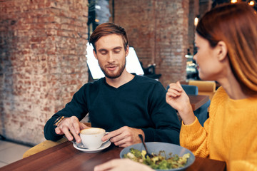 young couple having dinner in restaurant