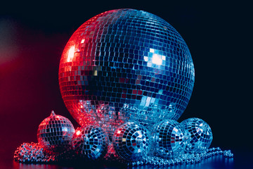 Big disco ball close up on dark background