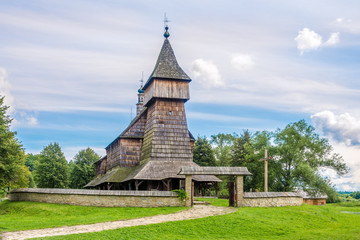 Fototapeta na wymiar View at the Wooden church of Saint Nicholas in Sanok Skanzen - Poland