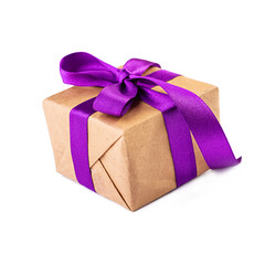 Gift box with purple ribbon isolated on white background