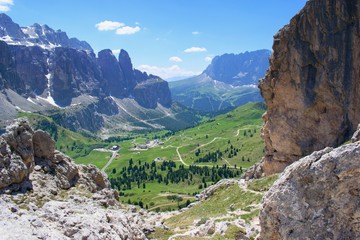 Beautiful summer mountain scenery with rocks  and green hills - Passo Gardena, Dolomites Italy.