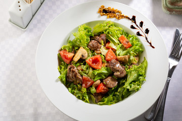 Tasty meat salad with vegetables, food close-up