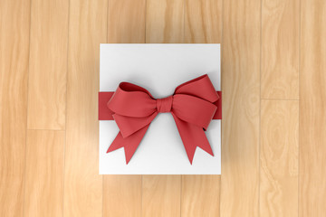 White new year or Christmas gift box with red ribbon for celebration concept on wooden board. with empty space for text and design, 3d illustration with clipping mask.