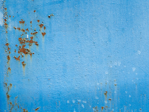 Texture of painted steel metal with rust. Blue rusted steel door