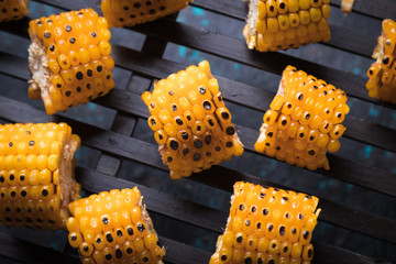 Grilled sweet corn slices
