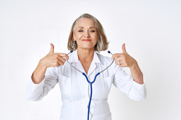 young female doctor showing ok sign