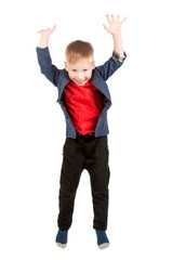 Jumping child boy on a white background. Isolated.