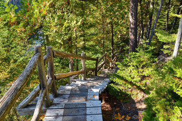 Hiking trail (wooden stairs) along the Rimouski river in The Canyon des Portes de l’Enfer (hell’s gate canyon) in Saint-Narcisse-de-Rimouski, Quebec, CANADA.