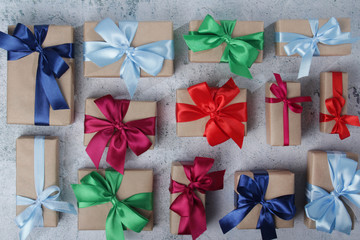 Gifting boxes with colorful satin ribbon bows