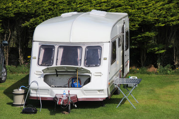 Caravan holiday, R.V. Vacation. Setting up the pitch. 