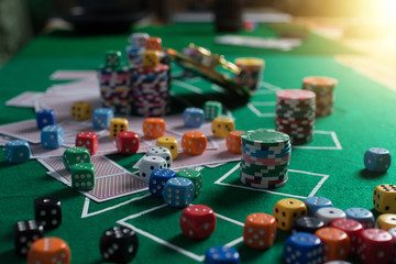 Casino equipment placed on the green floor for risky gambling for the people who want to get rich.