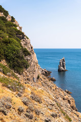 Seascape with a rock on the southern coast of Crimea