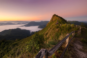 Panoramic view  morning sunrise at Phu Chi Dao, the unseen spot of sea fog on mountain peak  in Chiang Rai, Thailand. Panorama nature landscape