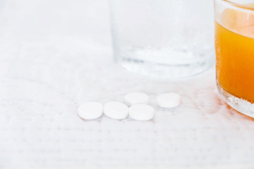 The water and orange juice are placed in a wooden tray, suitable for drinking to refresh and heal the body.