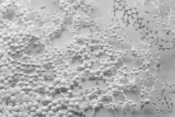 The texture of expanded polystyrene closeup. Sound and thermal insulation for construction, production of containers and lodges.