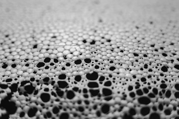 The texture of expanded polystyrene closeup. Sound and thermal insulation for construction, production of containers and lodges.