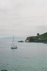 Vocation in Greece, Corfu. Water, cliff, mountains, and beautiful summer evening 