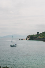 Vocation in Greece, Corfu. Water, cliff, mountains, and beautiful summer evening 