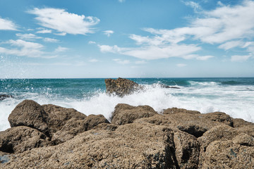 Ocean waters crashing in the rocks. Biarritz, France