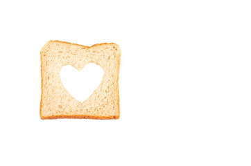 Love Concept. Bread slice with a shape of heart.