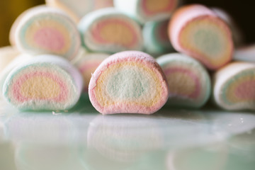Colorful marshmallows as background. Close up of fluffy marshmallows with copy space. 