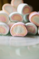 Colorful marshmallows as background. Close up of fluffy marshmallows with copy space. 