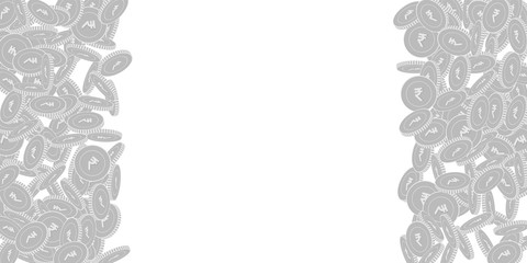 Indian rupee coins falling. Scattered black and wh