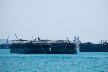 Conventional vessel bulk cargo ship with cover in sea gulf.