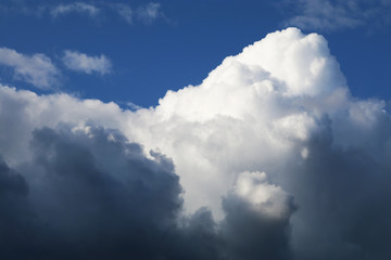 puffy clouds blue sky