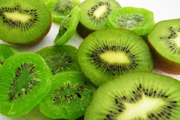 slices of kiwi on white background