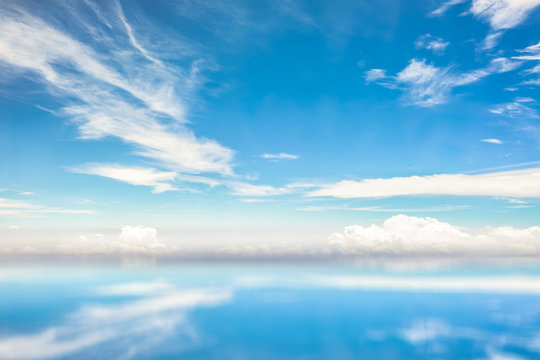 Blue sky and white clouds reflecton in bright day landscape background use for banner or cover design.